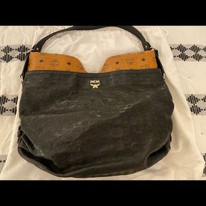 MCM Embossed Black and Tan Hobo Bag